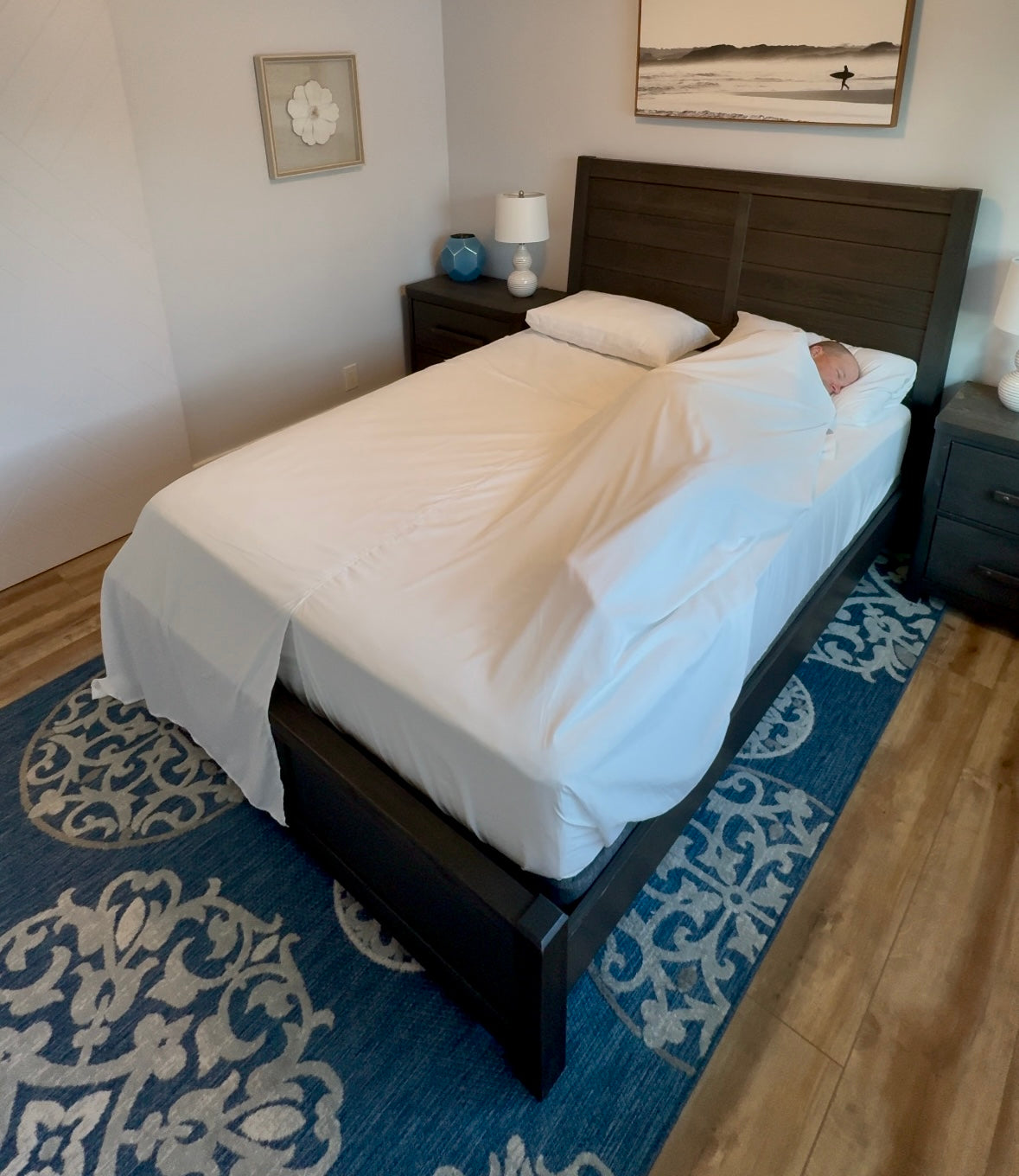 Load video: How to wash Butterfly Sheets properly by folding at the center seam to prevent the fitted sheet from wrapping around the top sheet.